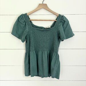 Madewell teal top with stetch bust and ruffle bottom with buttons down back